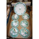 A SET OF SIX QUEEN ANNE CHINA 'MARILYN' PATTERN TRIOS AND CAKE PLATE