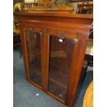 A VICTORIAN MAHOGANY GLAZED TWO DOOR BOOKCASE (OFF A BUREAU) H-122 W-107 CM