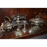 A QUANTITY OF SILVER PLATED METALWARE TO INCLUDE CANDLE STICKS, SPIRIT KETTLE ETC.