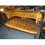 AN EDWARDIAN MAHOGANY UPHOLSTERED SMALL CURVED BACK SETTEE W- 134 CM