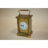 A FRENCH BRASS BAYARD 8 DAY CARRIAGE CLOCK TOGETHER WITH A SWITZER CLOCK/LIGHTER