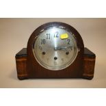 AN INLAID OAK MANTEL CLOCK, STRIKING ON BARS