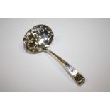 A HALLMARKED SILVER SIFTER SPOON