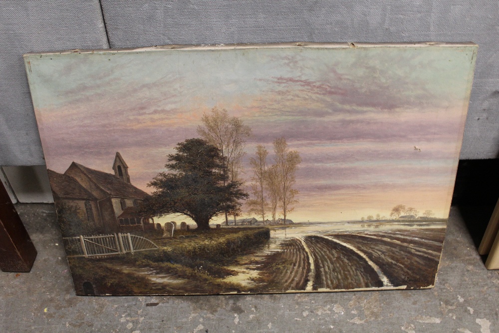 AN UNFRAMED ANTIQUE OIL ON CANVAS DEPICTING A RURAL LANDSCAPE WITH CHURCH INDISTINCTLY SIGNED