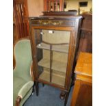 AN EDWARDIAN MAHOGANY DISPLAY CABINET - WORM DAMAGE