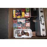 A BOX OF NOVELTY QUIZ GAMES, POKER SET ETC.