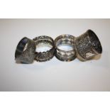 THREE HALLMARKED SILVER NAPKIN RINGS TOGETHER WITH ANOTHER