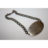 A WORLD WAR II SILVER ID BRACELET