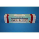A BOXED COLLECTORS SERIES HAND PAINTED MODEL OF CORONATION STREET