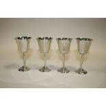 A SET OF FOUR HALLMARKED SILVER GOBLETS