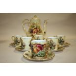 AN AYNSLEY ORCHARD GOLD COFFEE POT AND SET OF SIX AYNSLEY ORCHARD GOLD COFFEE CUPS AND SAUCERS