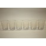 A SET OF SIX FLORALLY ETCHED DRINKING GLASSES