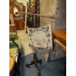 A WILLIAM IV ROSEWOOD POLE SCREEN WITH NEEDLEPOINT PENNANT SCREEN S/D