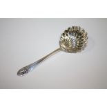 A HALLMARKED SILVER SIFTER SPOON