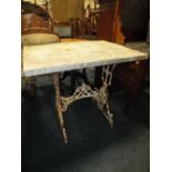 A VINTAGE CAST TABLE WITH HEAVY MARBLE TOP H-76 W-84.5 CM A/F