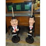 A PAIR OF UNUSUAL 'STAN LAUREL AND OLIVER HARDY' FIGURATIVE TOILET ROLL HOLDERS (2)