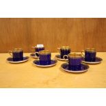 A SET OF SIX CROWN DEVON FIELDINGS 1025 BLUE AND GILT COFFEE CANS AND SAUCERS