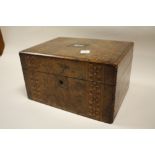 AN ANTIQUE INLAID WALNUT WORKBOX WITH MOTHER OF PEARL CARTOUCHE