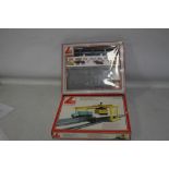 A BOXED 00 GAUGE LIMA OPERATING CONTAINER TERMINAL plus boxed 00 Gauge Automatic Car Unloader.