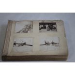 AN EDWARDIAN PHOTOGRAPH ALBUM, containing American interest photographs of ships and various