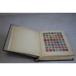 AN ALBUM OF BRITISH COMMONWEALTH STAMPS, to include a selection of Straits settlements, Malaya etc