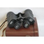 CARL ZEISS, JENA JENOPTEM 10 X 50 BINOCULARS, in fitted brown leather case