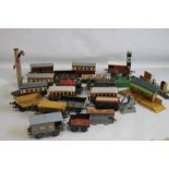 A UNBOXED 0 GAUGE HORNBY CLOCKWORK TRAIN SET WITH TWO KEYS, to include two Locomotives, twelve