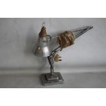 A VINTAGE "'HERBERT TERRY OF REDDITCH"' ANGLE POISE DESK LAMP. chrome base and arm, with aluminium