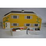 A 1970s LUNDBY DOLLS HOUSE, with two boxes of furniture and small dolls etc.