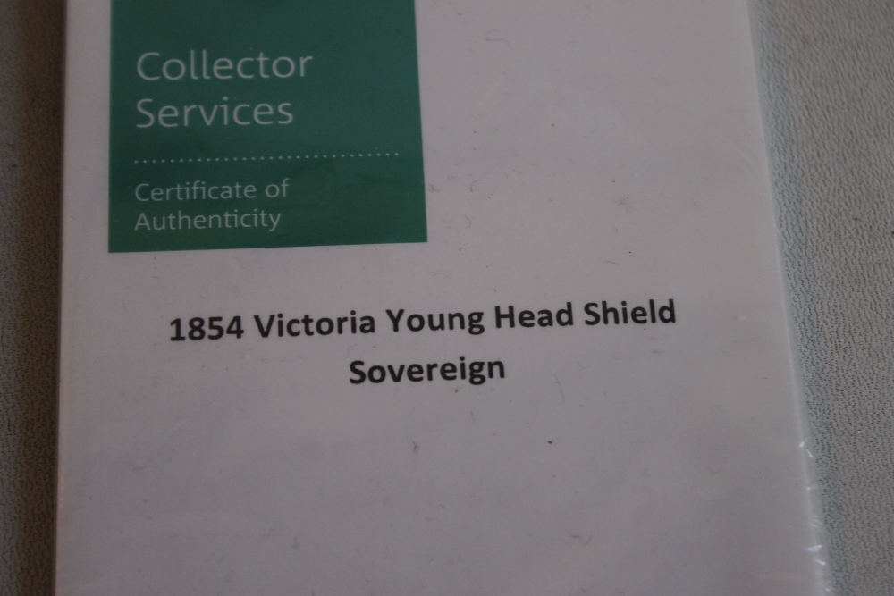 A VICTORIAN 1854 SHIELD BACK SOVEREIGN IN ROYAL MINT COLLECTORS SERVICES PACKET. - Image 2 of 2