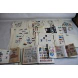 A COLLECTION OF BRITISH STAMPS TO SHEETS, AND IN ALBUMS, to include a small album of stamps