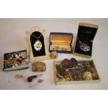 A CIGAR BOX OF VINTAGE COSTUME JEWELLERY, to include a brooch made from a nurse's buckle etc