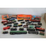 CIRCA THIRTY PIECES OF ROLLING STOCK, BOTH COVERED AND UNCOVERED to include wagons, mainly Hornby