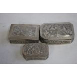 THREE CHINESE EXPORT WARE WHITE METAL SNUFF/TRINKET BOXES, all with typical embossed decoration
