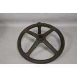 A BRASS/BRONZE FOUR SPOKE FLY WHEEL POSSIBLY FROM A WWI ARTILLERY PIECE D 30.5 cm