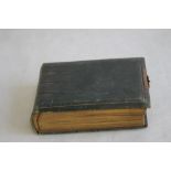 A VICTORIAN PHOTOGRAPH ALBUM, containing a selection of Portraits