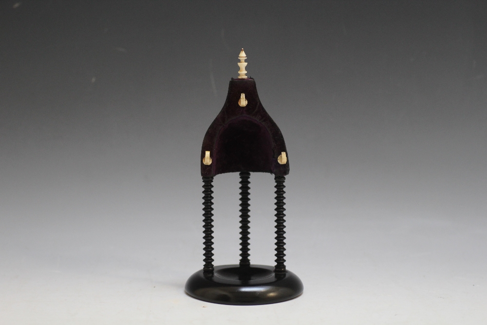 AN EBONISED POCKET WATCH STAND, H 20 cm