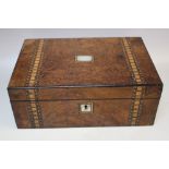 A 19TH CENTURY WALNUT INLAID DRESSING BOX, with mother of pearl panel to the lid, plain interior,
