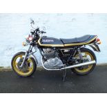 A 1982 DUCATI 350 GTV MOTORCYCLE 'JKK 901Y', having black coachwork, gold painted wheels and