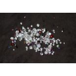 A BAG OF LOOSE MIXED STONES, including cubic zirconia, ruby, garnet, jade and sapphire 91.95ct