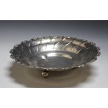 A CONTINENTAL SILVER FOOTED DISH, stamped 875 and raised on three ball feet, approx weight 405g, Dia