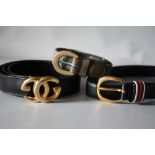 A VINTAGE BLACK LEATHER GUCCI D BELT WITH GOLDTONE DOUBLE G BUCKLE, L 93 cm, together with a navy