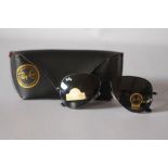 A PAIR OF RAY BAN AVIATOR LARGE METAL SUNGLASS, model RB3025, with original stickers to lenses,