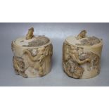 A PAIR OF 19TH CENTURY CHINESE CARVED IVORY LOW POTS AND LIDS, each with carved decoration of