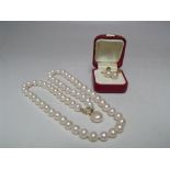A SINGLE STRAND HAND KNOTTED CULTURED PEARL NECKLACE WITH 9CT GOLD CLASP, approx L 48 cm, together