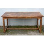 AN EARLY 20TH CENTURY ARTS AND CRAFTS STYLE REFECTORY TABLE, the twin plank top above shaped squared