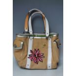 A COACH LINEN HANDBAG, open topped with flat leather handles, stitched floral detailing, two