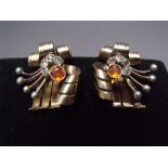 A PAIR OF DESIGNER STYLE YELLOW AND WHITE METAL DIAMOND AND CITRINE SET CLIP ON EARRINGS, approx