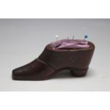 A WOODEN SHOE PIN CUSHION, W 9 cm