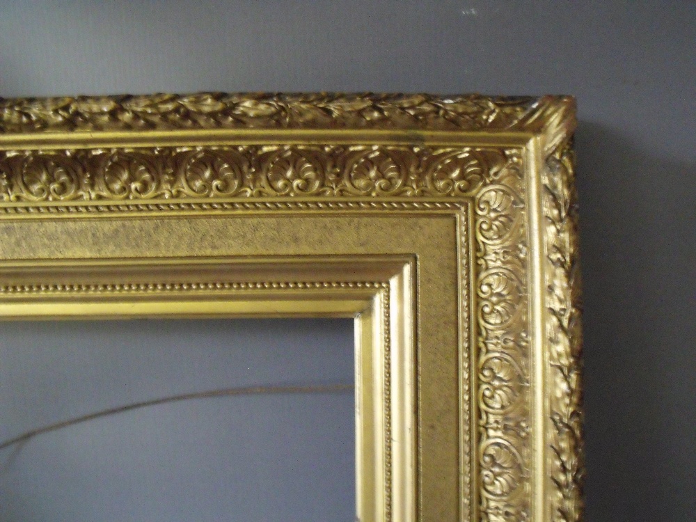 A 19TH CENTURY DECORATIVE GOLD FRAME WITH ACANTHUS LEAF DESIGN TO OUTER EDGE, frame W 12 cm, frame